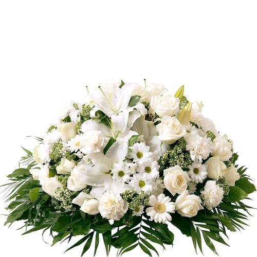 Rich arrangement with white seasonal flowers