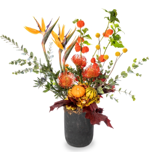 Big autumn bouquet into a stone vase