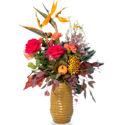 Tall vase with autumn floral arrangement