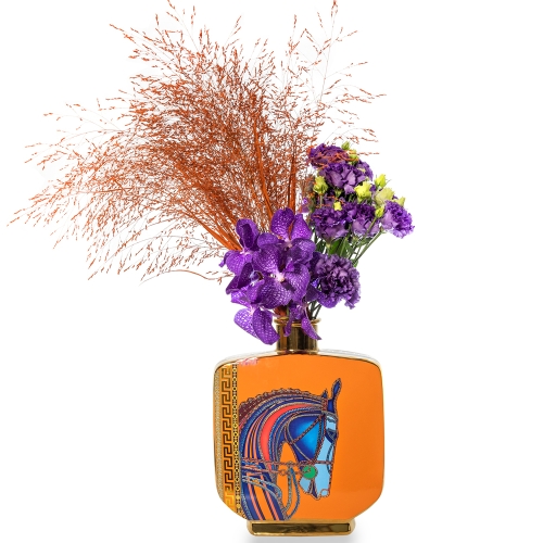 Orange horse figurine vase with purple vanda orchid