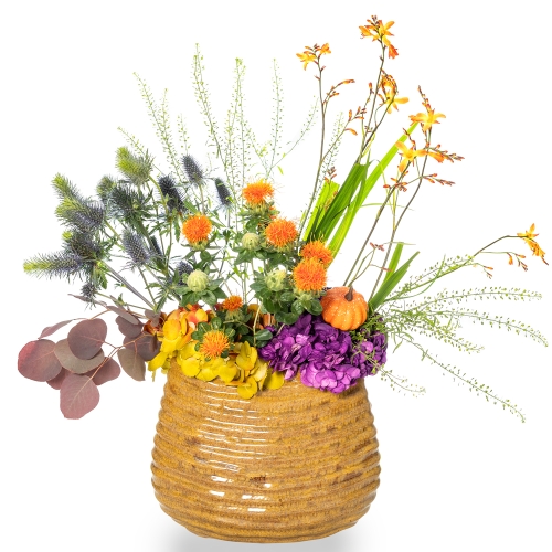 Short vase with autumn flowers and foliage