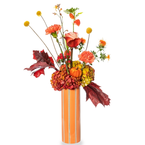Orange tall vase with autumn floral arrangement