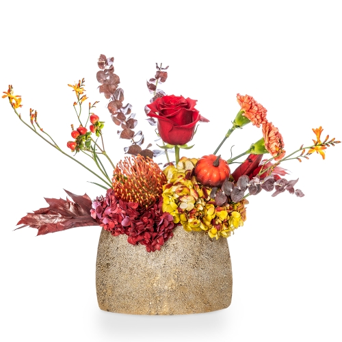 Golden vase with hydrangeas and autumn flowers