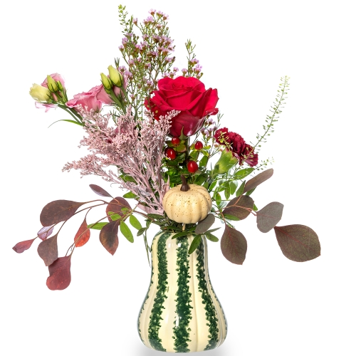 Green pumpkin vase with automn flowers