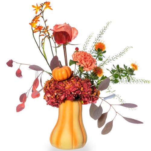 Orange-yellow pumpkin with hydrangea and orange flowers