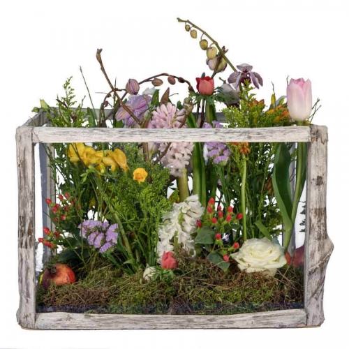 Large aquarium with seasonal flowers