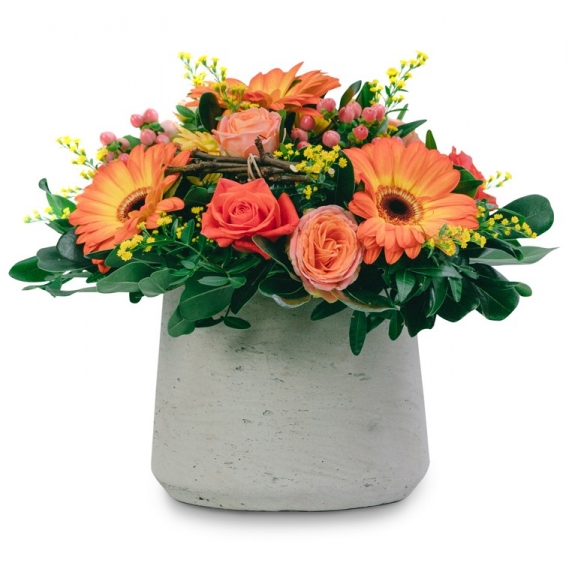 Orange arrangement in a stone pot