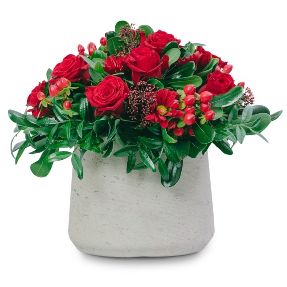 Red arrangement in a stone pot