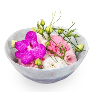 Colorful flower arrangement on a plate