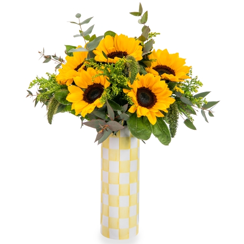 Sun flowers in checked yellow vase