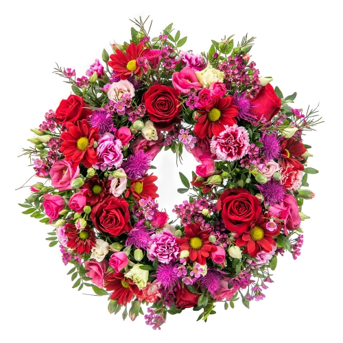 The first of may wreath in pink and red shades