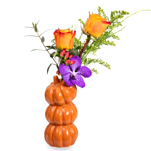 Flower arrangement in a pumpkin vase