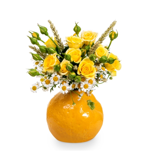 Orange vase with yellow roses