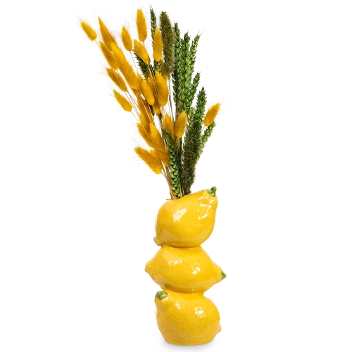Lemon vase with yellow and green died cereals