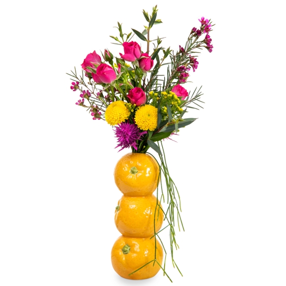 Oranges vase with fresh flowers