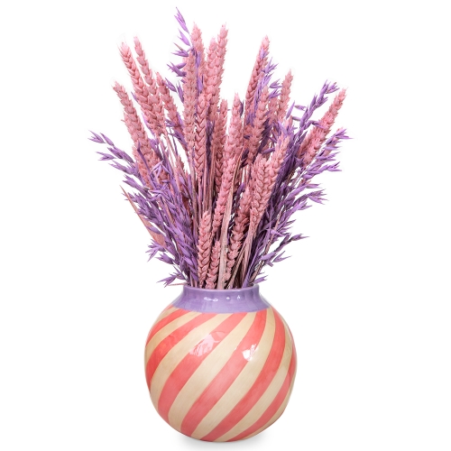 Dried cereals in pink striped vase