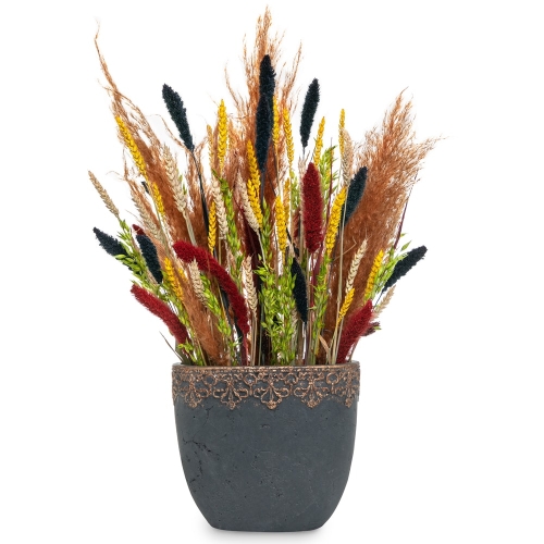 Dried colorful grains in a wide clay vase
