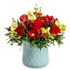 Flower arrangement with red roses and orchids