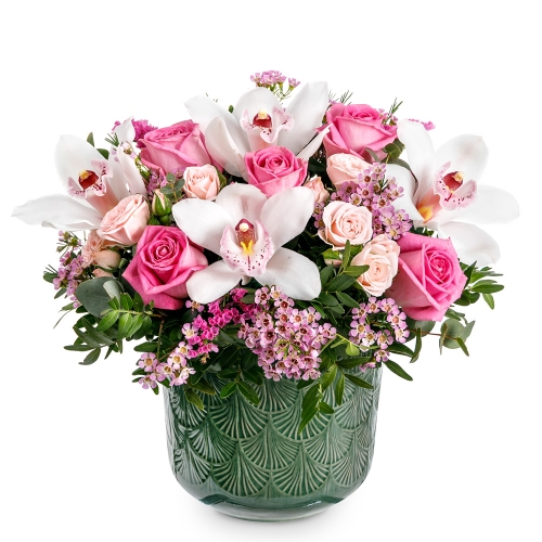 Floral arrangement with pink roses and white cymbidium