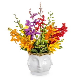 Colorful orchids in a white-gold luxury vase