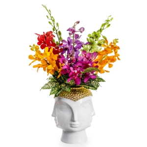 Colorful orchids in a luxury vase with faces