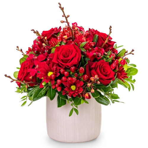 Red roses and chrysanthemums in grey pot