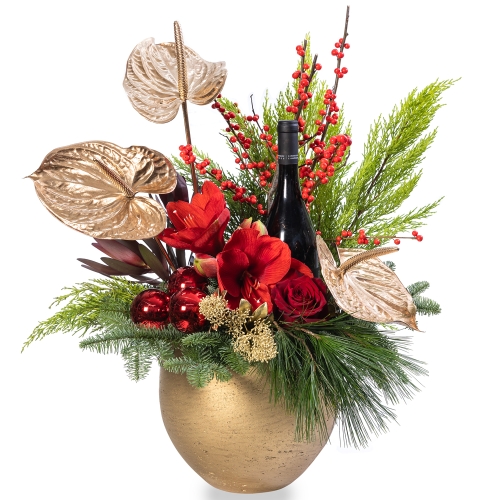 Golden Christmas flower arrangement with wine