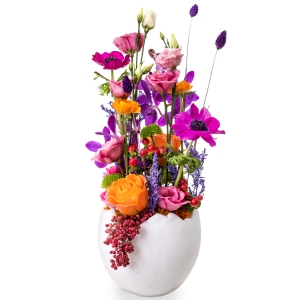 Easter flower arrangement in an egg shaped pot