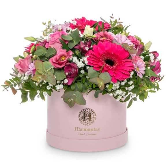 Beautiful arrangement in a box in pink and fuchia