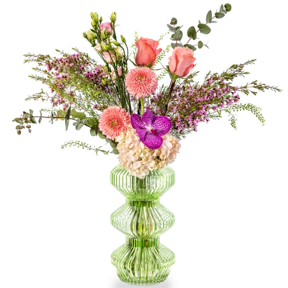 Green glass vase with hydrangea, gerbera, lisianthus and wax flower