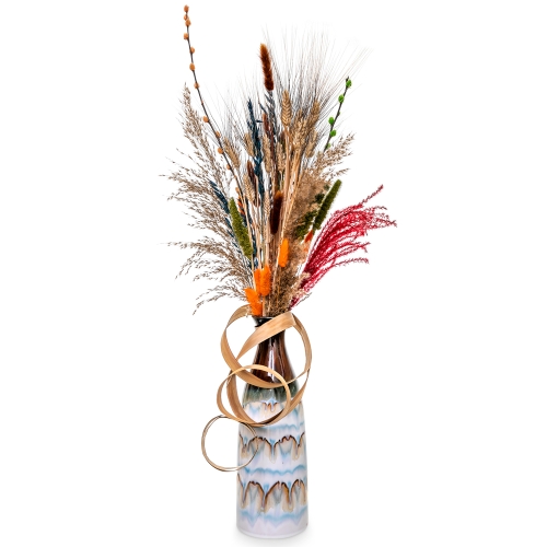 Pampas and dried plants in light blue vase