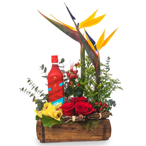 Floral arrangement with sterlitzias with Johnnie Walker Red Whiskey
