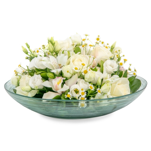 A glass plate with white flowers